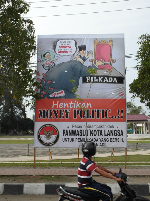 A poster in Aceh, Indonesia warns that selling votes leads to corruption